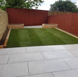 Full re design on this one, Oversized Porcelain paving with Oak sleeper raised beds and a new lawn on this job in West Bridgford : Click Here To View Larger Image