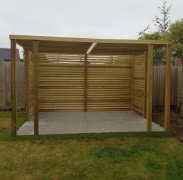 Small outdoor dining area in West Bridgford. Plained timber pergola to provide shade and Porcelain paving.: Click Here To View Larger Image